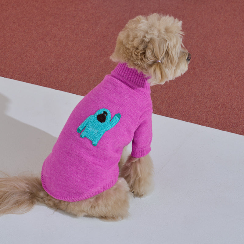 maltipoo wearing Banana mania knit sweater in magenta color