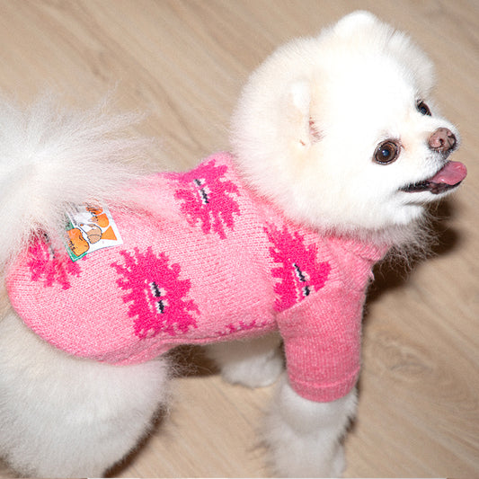 pomeranian is wearing anemone knit sweater in pink color